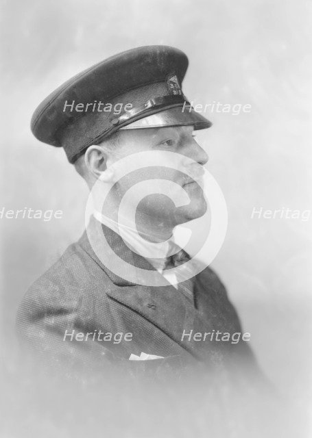 Portrait of a man in uniform, c1935. Creator: Kirk & Sons of Cowes.