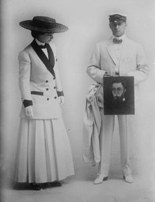 Paula Marr and Wm. Collier holding picture, 1910. Creator: Bain News Service.