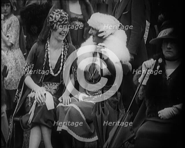 Three Smartly Dressed Female Civilians Sitting on Chairs, 1924. Creator: British Pathe Ltd.