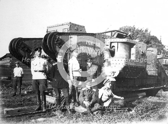 Soldiers of the Volunteer Army before the tank 'General Drozdovsky, 1919.  Artist: Anon
