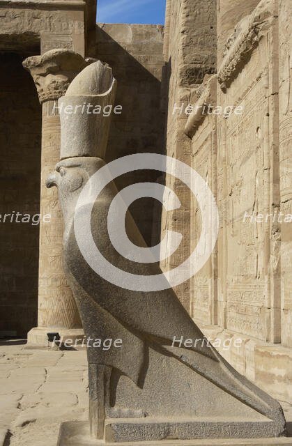 Statue of God Horus wearing the double crown..., Temple of Edfu, Egypt, Ptolemaic period, (2003).  Creator: LTL.