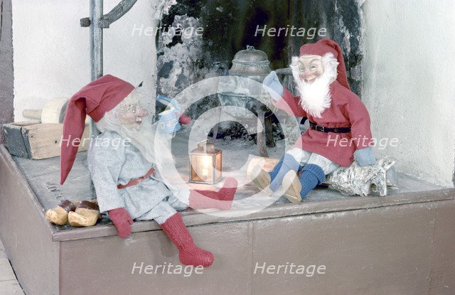 Christmas brownies on a mantelpiece, 1960s. Artist: Göran Algård