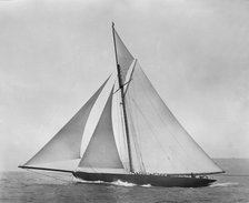 The cutter 'Shamrock' beating to windward. Creator: Kirk & Sons of Cowes.