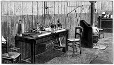 A corner of Pierre and Marie Curie's laboratory, Paris, 1904. Artist: Anon