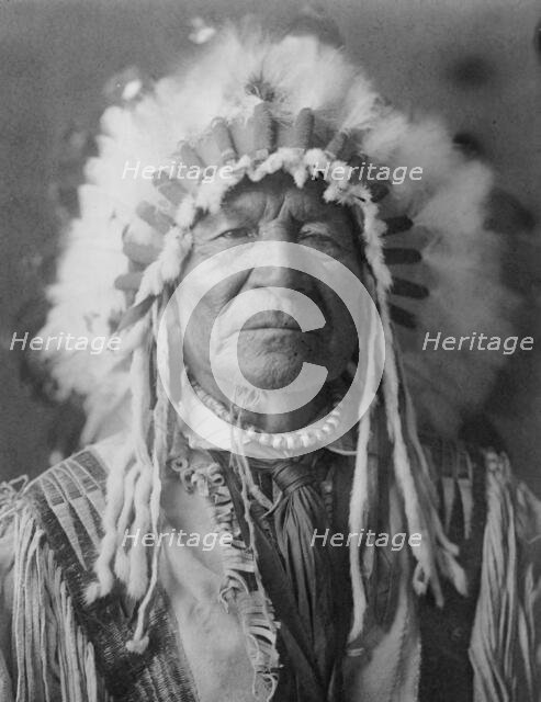 Sitting Bear-Arikara, c1908. Creator: Edward Sheriff Curtis.