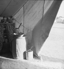 Tent of migratory workers in FSA camp (emergency), Calipatria, Calififornia, 1939. Creator: Dorothea Lange.