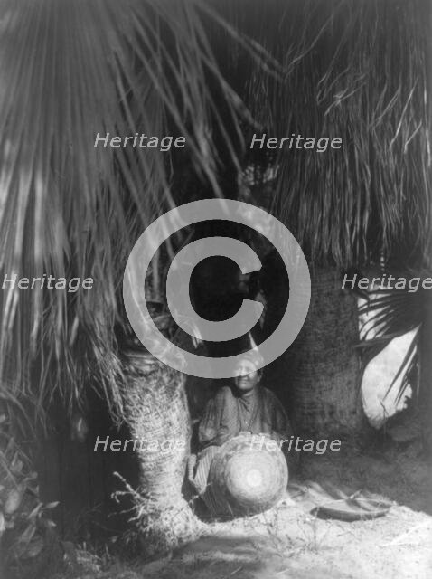 Under the palms-Cahuilla, 1905, c1924. Creator: Edward Sheriff Curtis.