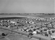 Farm Security Administration camp for migrant agricultural workers at Shafter, California, 1938. Creator: Dorothea Lange.