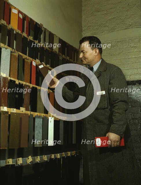 Laboratory worker at the research laboratory at the C & NW RR's 40th Street yard, Chicago, 1942. Creator: Jack Delano.
