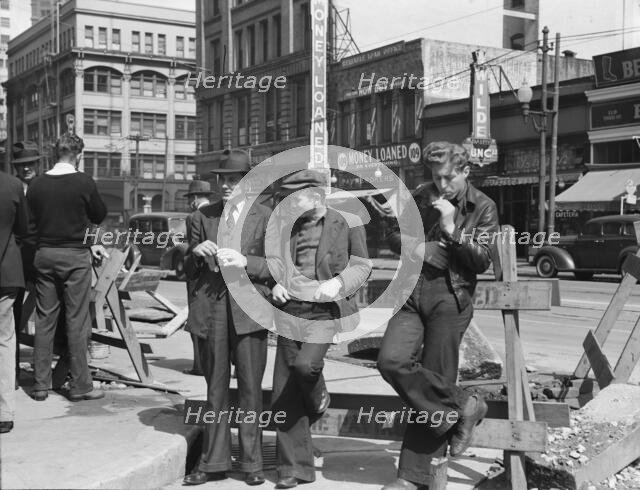 Unemployed young men pause a moment..., Salvation Army, San Francisco, California, 1939. Creator: Dorothea Lange.