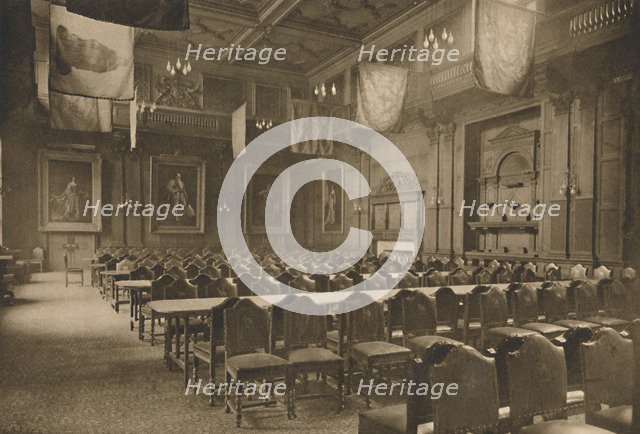 'Flag-Hung Great Hall in Which the Powerful Company of Grocers Holds Its Banquets', c1935. Creator: Unknown.