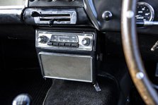 Radio in a 1961 Aston Martin DB4 GT SWB lightweight. Creator: Unknown.