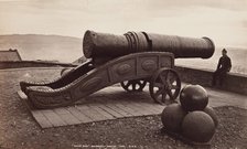 Man with Cannon, Edinburgh Castle, between 1870 and 1880. Creator: George Washington Wilson.