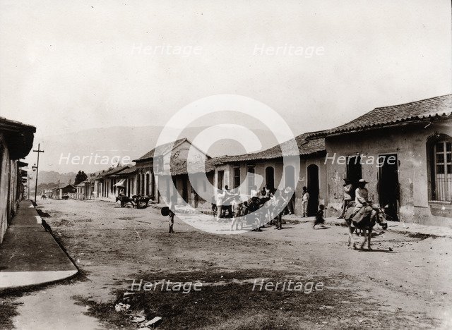 A street scene in a Venezuelan village, 1897. Artist: Unknown