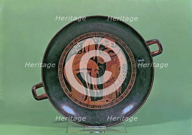 Attic Cup with the representation of Athena and the Dragon of Colchis throwing the body of Jason.