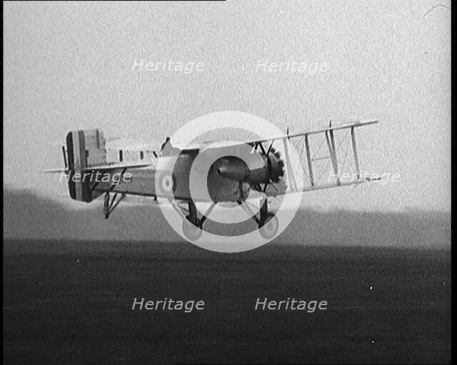 Male British Pilot Taking Off On a Large Plane, 1920s. Creator: British Pathe Ltd.