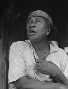 Fifty-seven year old sharecropper woman, Hinds County, Mississippi, 1937. Creator: Dorothea Lange.
