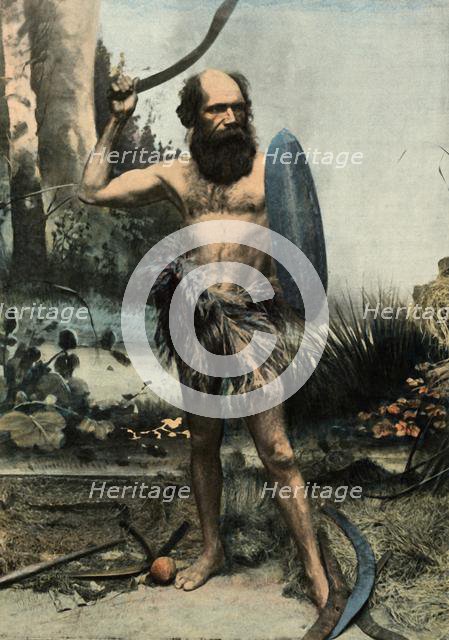 'Indigene Australien Arme Du Boumerang', (Aborigine armed with a Boomerang), 1900. Creator: Unknown.