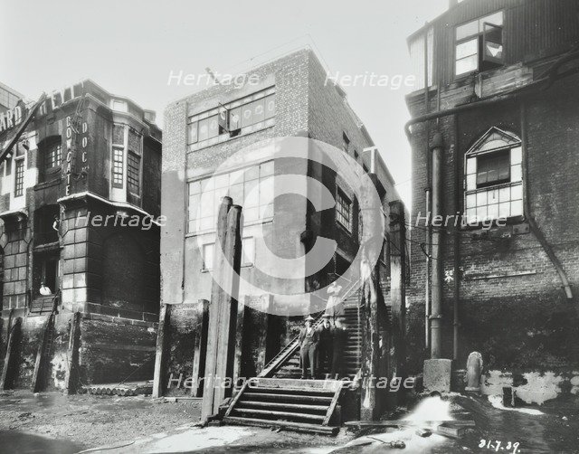 Steps down to the river, Dowgate Dock, Upper Thames Street, City of London, 1939. Artist: Unknown.
