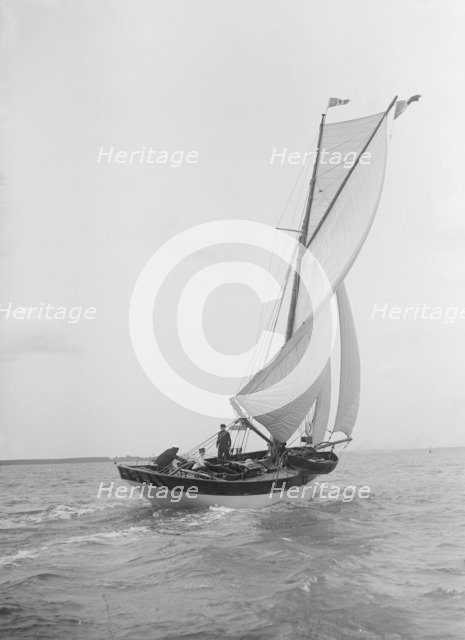 The cutter 'Nereid' under sail, 1912. Creator: Kirk & Sons of Cowes.