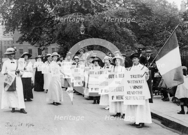 Suffragettes on a 'poster parade' selling the Suffragette, 31st July, 1914. Artist: Unknown