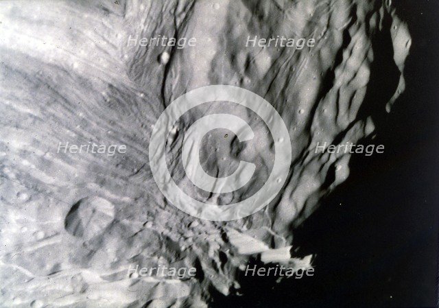 Miranda, one of the moons of Uranus, seen from Voyager 2, 24 January 1986. Creator: NASA.
