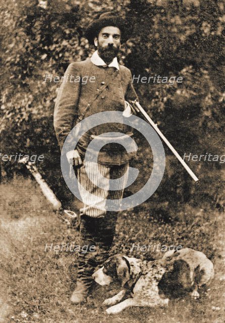 Isaac Ilyich Levitan (1860-1900) with his dog Vesta, before 1893. Creator: Anonymous.