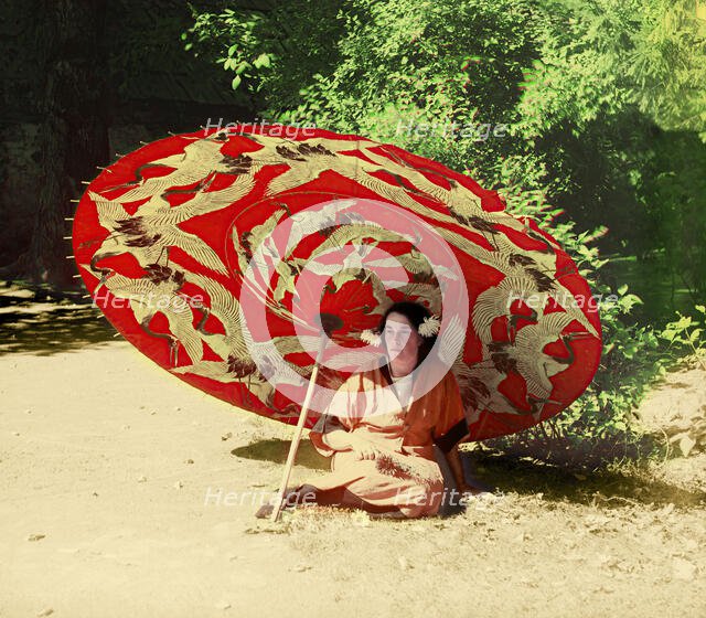 Woman sitting under a parasol, between 1905 and 1915.  Creator: Sergey Mikhaylovich Prokudin-Gorsky.