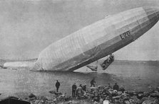 'Trois Zeppelins detruits en trois jours. Le "L20" dans un fjord de Norvege; En derivant..., 1916. Creator: Unknown.