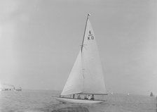 The 6 Metre 'Flya' (K13) sailing close-hauled, 1921. Creator: Kirk & Sons of Cowes.