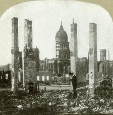 'City Hall - Photographer in foreground - Tall brick chimneys left standing', . Creator: Unknown.