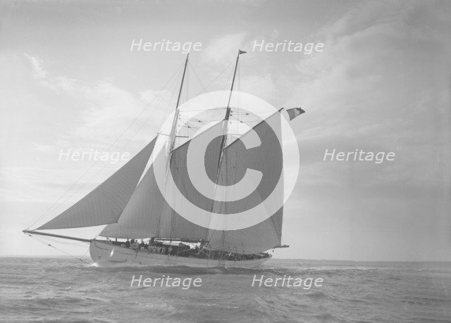 The schooner 'Halcyon' under sail, 1911. Creator: Kirk & Sons of Cowes.