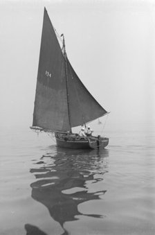 Fishing Smack under sail, 1911. Creator: Kirk & Sons of Cowes.