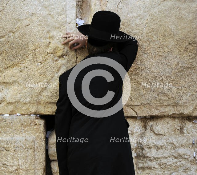 A Jew praying at the Western Wall, Jerusalem, Israel, 2013.  Creator: LTL.
