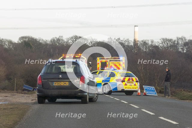 Police car and ambulance attending road traffic accident 2018. Creator: Unknown.