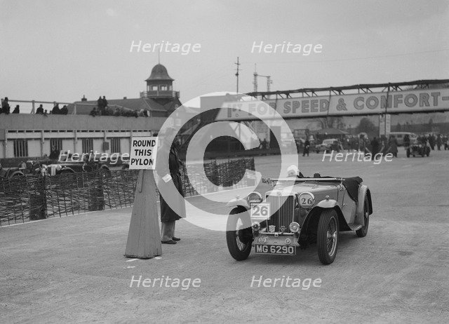 MG TA competing in the JCC Rally, Brooklands, Surrey, 1939. Artist: Bill Brunell.