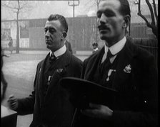 Male Ex-Services Civilians Playing a Hurdy-Gurdy For Money in the Street, 1920s. Creator: British Pathe Ltd.