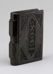 Coal carved in shape of a book, 1900s. Creator: F Jukes.