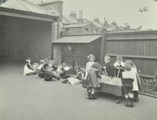 Children in the playground, Southfields Infants' School, Wandsworth, London, 1906. Artist: Unknown.
