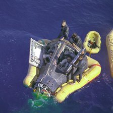 Gemini VIII splashdown, Armstrong and Scott with hatches open, March 16, 1966.  Creator: NASA.