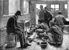 Boiling and testing opium in China, 1881. Creator: Frank Dadd.