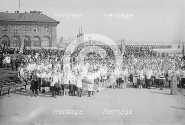 Raising N.Y.City's flag, 1916. Creator: Bain News Service.
