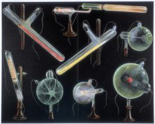 Various substances fluorescing in vacuum tubes of different shapes, 1903. Artist: Unknown