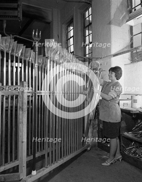 Packing garden forks for dispatch, Brades Tools, Sheffield, South Yorkshire, 1966. Artist: Michael Walters