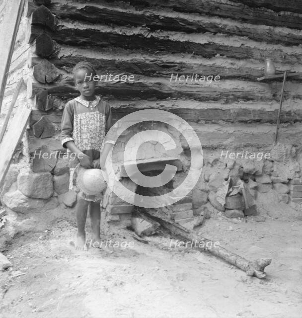Possibly: Grandchildren of tobacco sharecropper down at barns, Wake County, North Carolina, 1939. Creator: Dorothea Lange.
