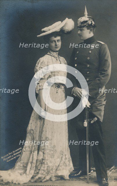 'German couple. With male in dress uniform', 1906. Artist: Unknown.