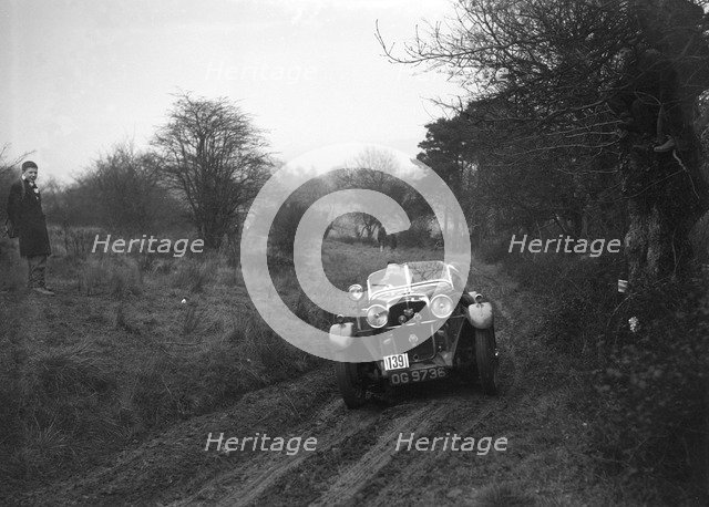 Standard Avon of J Priestly at the Sunbac Colmore Trial, near Winchcombe, Gloucestershire, 1934. Artist: Bill Brunell.