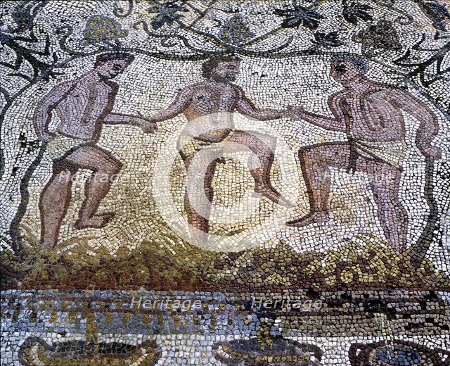 Mosaic in the Amphitheatre house representing treading grapes, preserved in the archaeological si…