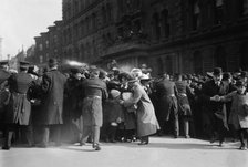 Police keeping crowd back, St. Patricks Day, 1913. Creator: Bain News Service.