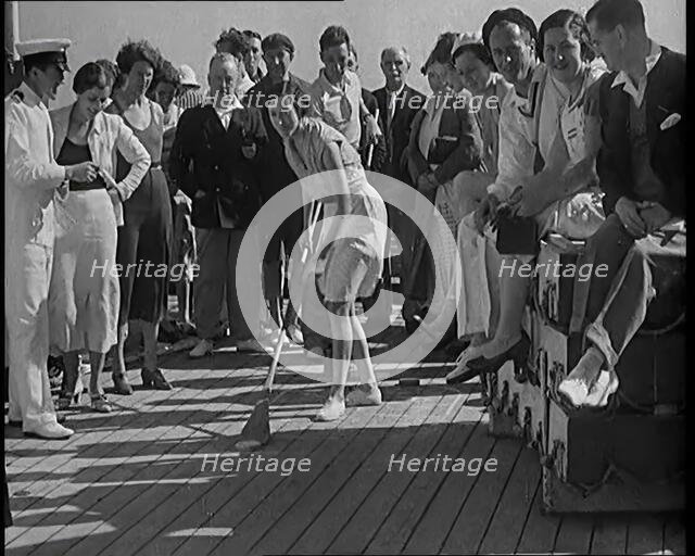 People Enjoying Games on Deck of a Cruise Liner Whilst at Sea, 1931. Creator: British Pathe Ltd.